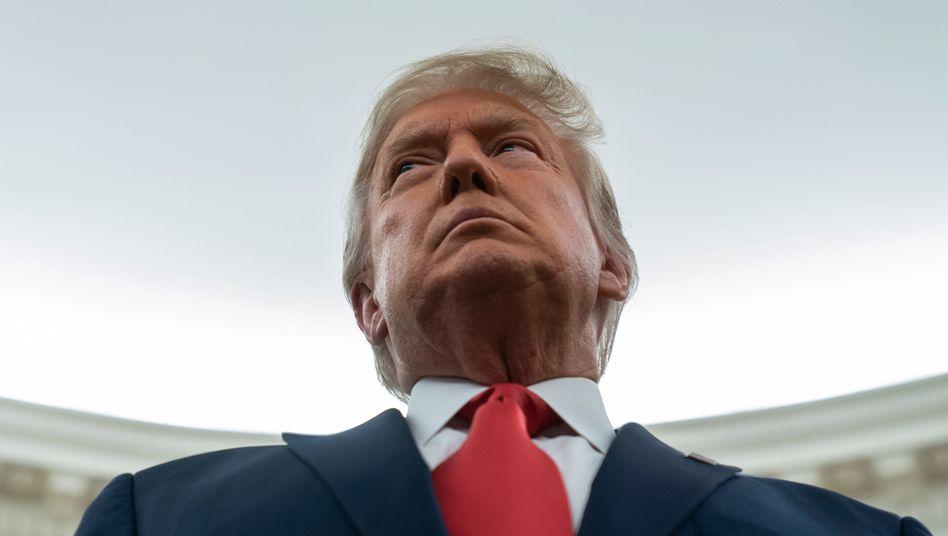 Trump — Photo by Evan Vucci AP