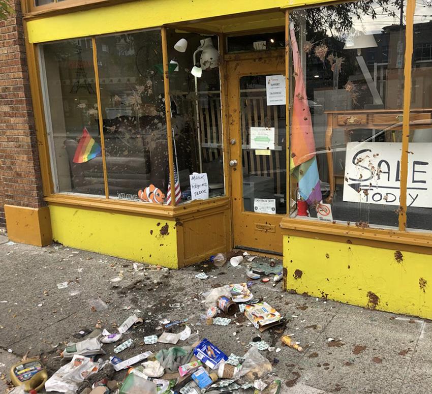 Used Furniture storefront after the most recent attack — Photo courtesy of John Morrison