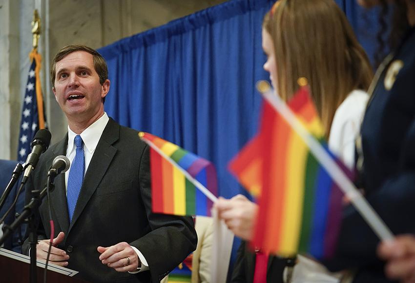 Kentucky Gov. Andy Beshear speaking at Gay rights rally in February of 2020 — Photo by Bryan Woolston / AP