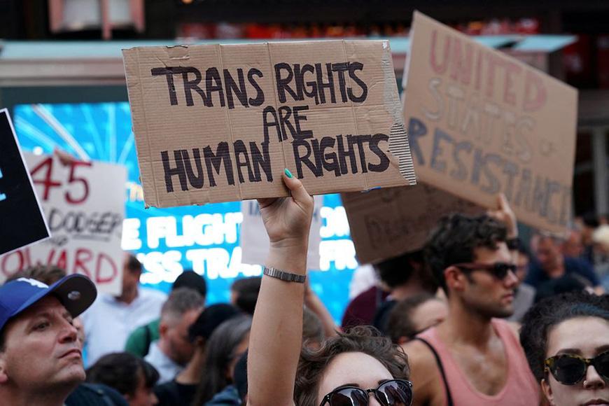 Trans rights protestors in Times Square in 2017 — Photo by Carlo Allegri / Reuters