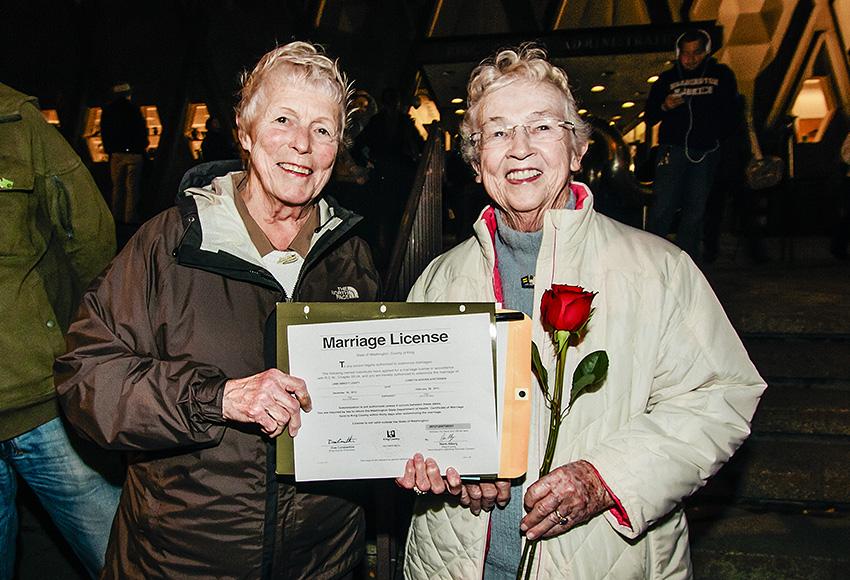 At midnight on Dec. 6, 2012, Jane Abbott Lightly, 77 and Pete-e Petersen, 85, became the first same-sex couple to receive a marriage license in King County, Washington — Photo by Nate Gowdy