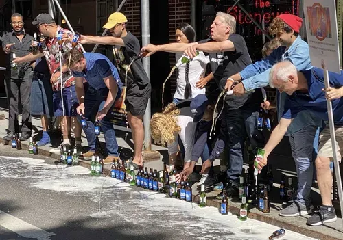 Pride weekend at Stonewall Inn: pour-out of Anheuser Busch beers 