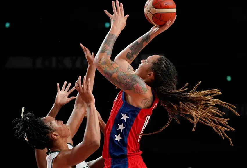 Brittney Griner (r) – Photo by Charlie Neibergall / AP