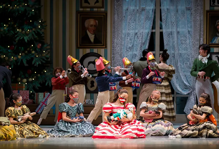Annalise Dautricourt as Clara (center) with Pacific Northwest Ballet School students in the party scene from George Balanchine's The Nutcracker®, choreographed by George Balanchine © The George Balanchine Trust – Photo © Angela Sterling