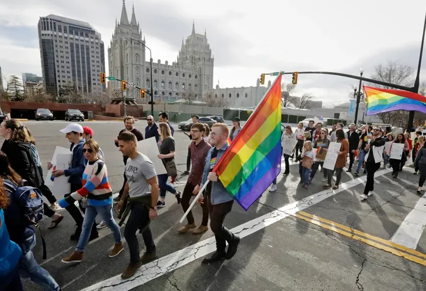BYU students march in Salt Lake City to protest the ban on same-sex romantic behavior – Photo by Rick Bowmer / AP