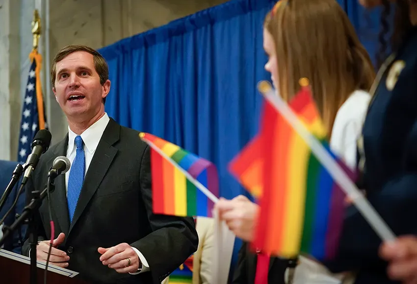 Kentucky Gov. Andy Beshear speaking at Gay rights rally in February of 2020 – Photo by Bryan Woolston / AP