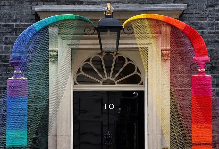 A rainbow arch installed at Number 10 Downing Street – Photo by Henry Nicholls / Reuters