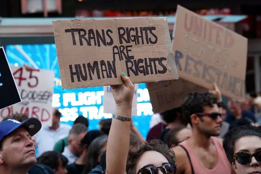 Trans rights protestors in Times Square in 2017 – Photo by Carlo Allegri / Reuters