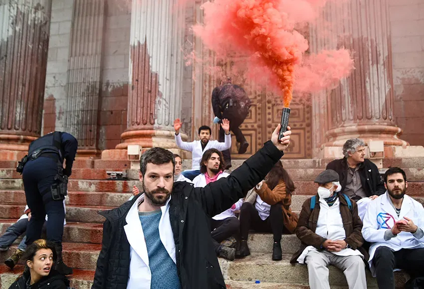 Scientists engage in civil disobedience on the steps of the Congress of Deputies in Madrid, Spain – Photo courtesy of Scientist Rebellion