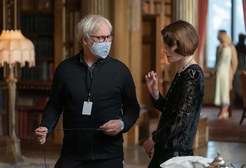 Director Simon Curtis and actor Michelle Dockery on the set – Photo by Ben Blackall / Focus Features
