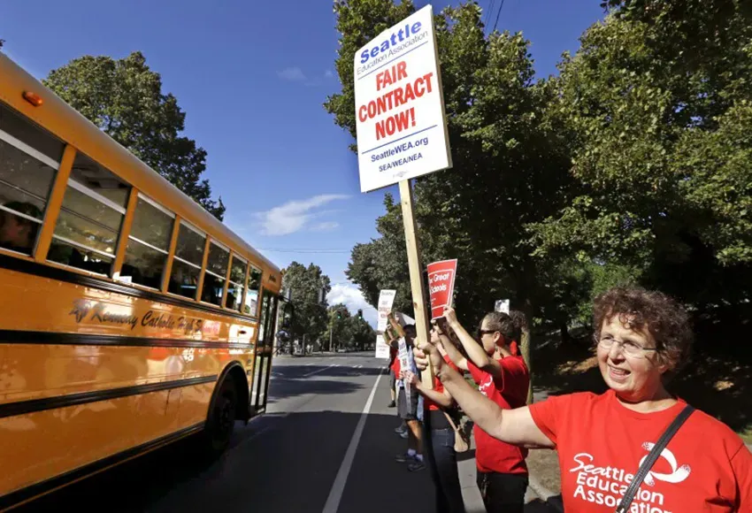 Photo by Elaine Thompson / AP