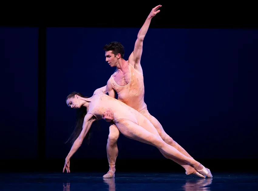 Pacific Northwest Ballet principal dancers Lesley Rausch and Lucien Postlewaite in Kent Stowell's Carmina Burana – Photo by Angela Sterling