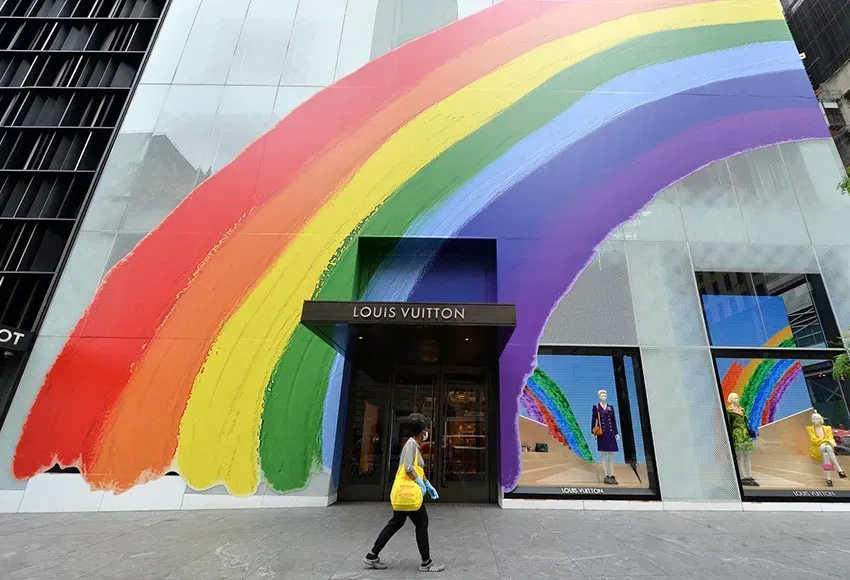 The Louis Vuitton flagship store, decorated for Pride in 2020 – Photo by Anthony Behar / Sipa USA via AP