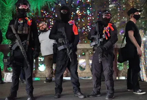 Masks off: Log Cabin Republicans join armed right-wing crowd harassing drag show