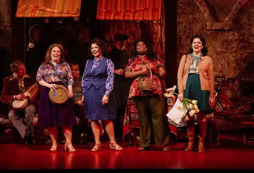 Sarah Mattox as Market Woman #3, Tess Altiveros as Market Woman #1, Ibidunni Ojikutu as Market Woman #2, and Sarah Coit as Fariba in A Thousand Splendid Suns at Seattle Opera – Photo by Antone Patterson