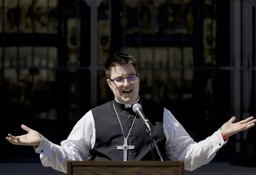 Bishop Megan Rohrer speaks to the press – Photo by John Hefti / AP