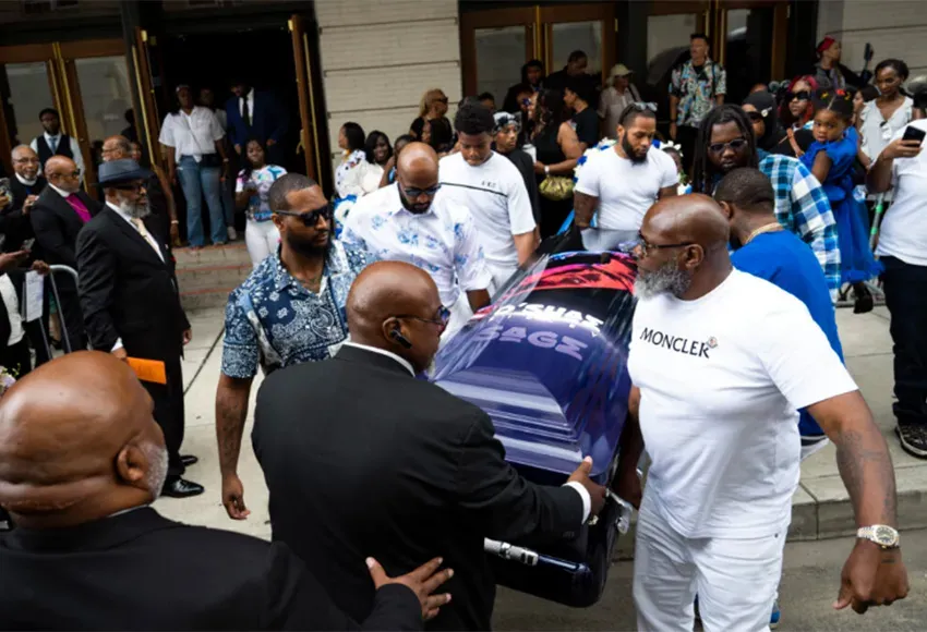Jack Kelly (r), father to O'Shae Sibley, carries the casket with fellow pallbearers following a celebration of life on Aug. 8, 2023 in Philadelphia, Penn. – Photo by Joe Lamberti / AP
