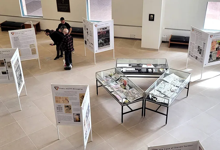 The exhibit is a combination of informative placards and issues of the paper in glass cases – Richard Issac