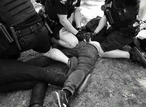 Cops mob Trans, Queers, and allies over popped balloon at Mayday USA counterprotest